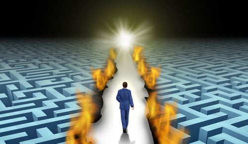 man-walking-through-burning-maze-toward-light-web.jpg